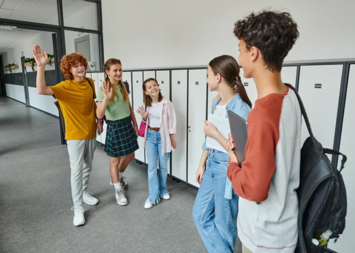 back-to-school-happy-teen-students-waving-hands-a-2023-11-27-05-25-18-utc